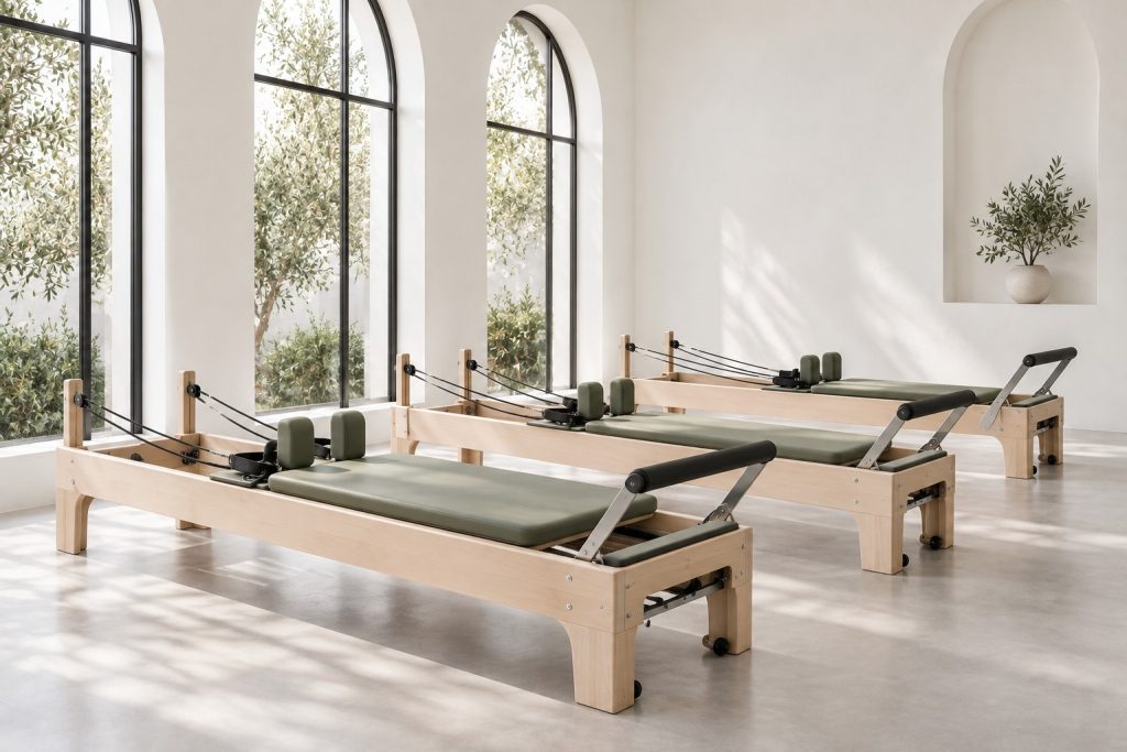 Bright ARIA studio with sage upholstered reformers